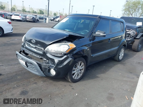 2012 Kia Soul + with VIN KNDJT2A67C7360534, listed as a IAAI auction lot 42096541 with 183,452 mi miles. Bid and sale history available at carsss.com. Image 2.