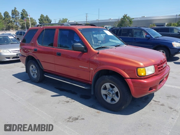 1999 Isuzu Rodeo S z VIN 4S2CK58WXX4346156, wystawiony jako IAAI lot #42328951 z przebiegiem 196 182 mil mil oraz . Historia ofert i sprzedaży dostępna na DreamBid. Obrazek 1.
