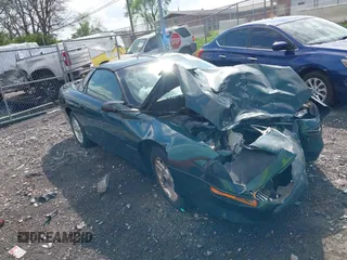 1995 Chevrolet Camaro z VIN 2G1FP22S6S2136188, wystawiony jako IAAI lot #41941962 z przebiegiem 104 621 mil mil oraz . Historia ofert i sprzedaży dostępna na DreamBid. Obrazek 1.