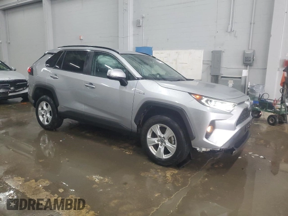 2020 Toyota RAV4 Hybrid XLE with VIN 2T3R6RFV1LW001235, listed as a Copart auction lot 56818635 with 105,234 mi miles and Salvage title. Bid and sale history available at DreamBid. Image 4.