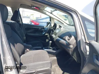 2017 Honda Fit LX with VIN JHMGK5H51HS023212, listed as a IAAI auction lot 42153107 with 106,778 mi miles. Bid and sale history available at carsss.com. Image 5.