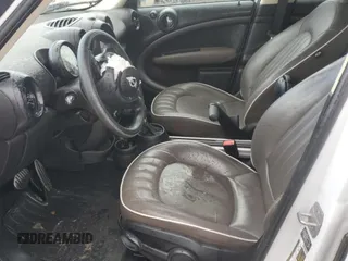 2014 MINI Countryman S z VIN WMWZC3C50EWP29415, wystawiony jako Copart lot #55579045 z przebiegiem 102 151 mil mil oraz Szkoda całkowita • Salvage title. Historia ofert i sprzedaży dostępna na DreamBid. Obrazek 7.