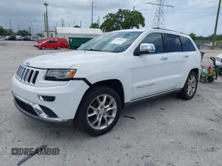 2014 Jeep Grand Cherokee Summit z VIN 1C4RJEJG1EC357948, wystawiony jako IAAI lot #42498652 z przebiegiem 213 715 mil mil oraz . Historia ofert i sprzedaży dostępna na DreamBid. Obrazek 2.