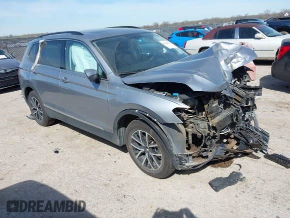 2021 Volkswagen Tiguan SE with VIN 3VV3B7AXXMM116774, listed as a IAAI auction lot 41868796 with Not Provided miles and . Bid and sale history available at DreamBid. Image 1.
