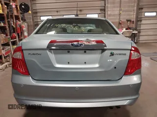 2010 Ford Fusion Hybrid z VIN 3FADP0L34AR276532, wystawiony jako IAAI lot #41491883 z przebiegiem 159 076 mil mil oraz . Historia ofert i sprzedaży dostępna na DreamBid. Obrazek 16.