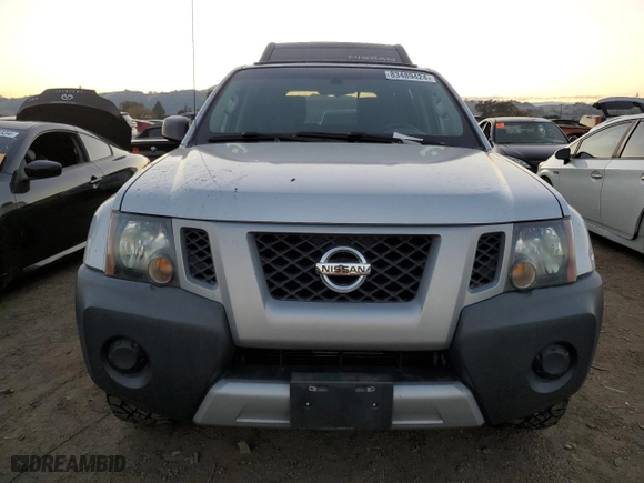 2013 Nissan Xterra X with VIN 5N1AN0NUXDN815814, listed as a Copart auction lot 83489424 with 70,602 mi miles and Salvage Title. Bid and sale history available at carsss.com. Image 5.