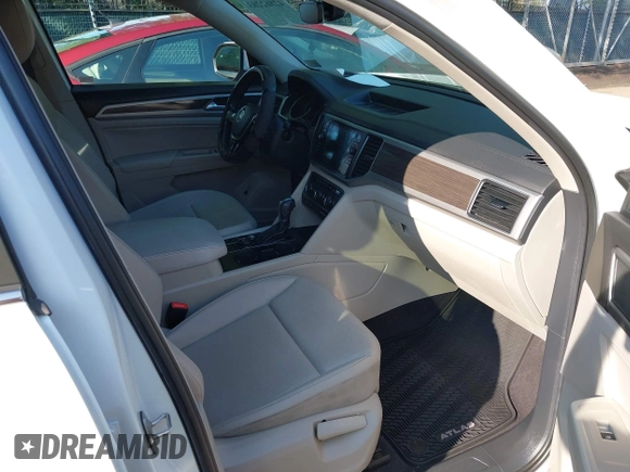 2018 Volkswagen Atlas SE z VIN 1V2LR2CA0JC520538, wystawiony jako IAAI lot #42862283 z przebiegiem 119 258 mil mil oraz . Historia ofert i sprzedaży dostępna na DreamBid. Obrazek 5.