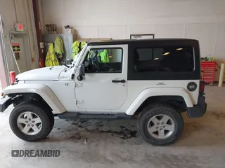 2015 Jeep Wrangler Sahara with VIN 1C4AJWBG7FL648621, listed as a IAAI auction lot 42439781 with 107,148 mi miles and . Bid and sale history available at DreamBid. Image 14.