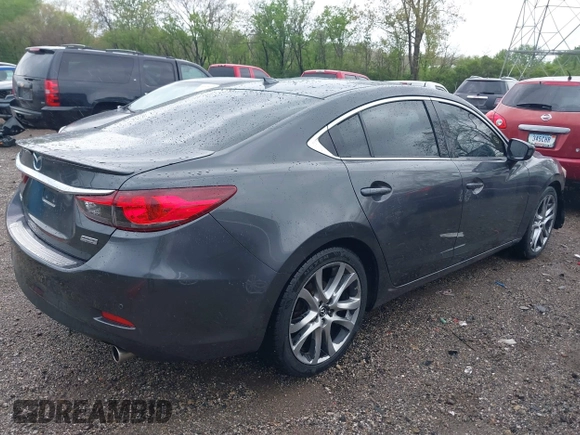 2014 Mazda 6 i Grand Touring с VIN JM1GJ1W66E1141962, выставлен на аукционе IAAI как лот 42119753 с пробегом 187 514 миль миль и . История ставок и продаж доступна на DreamBid. Изображение 4.