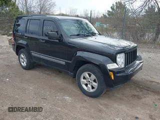 2012 Jeep Liberty Sport with VIN 1C4PJMAK8CW155559, listed as a IAAI auction lot 42131013 with 127,916 mi miles. Bid and sale history available at carsss.com. Image 1.