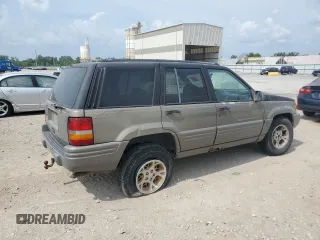 1996 Jeep Grand Cherokee Limited with VIN 1J4GZ78S3TC395758, listed as a Copart auction lot 60326205 with Not provided miles and Salvage title. Bid and sale history available at DreamBid. Image 3.