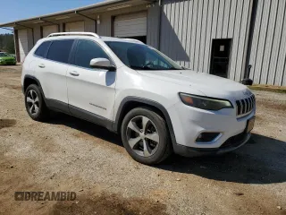2019 Jeep Cherokee Limited with VIN 1C4PJMDX0KD126347, listed as a Copart auction lot 48486885 with 111,061 mi miles and Salvage title. Bid and sale history available at DreamBid. Image 4.