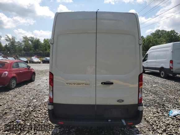 2021 Ford Transit Cargo с VIN 1FTBR1X80MKA26754, выставлен на аукционе Copart как лот 57982185 с пробегом 80 537 миль миль и Списание • Salvage title. История ставок и продаж доступна на DreamBid. Изображение 6.
