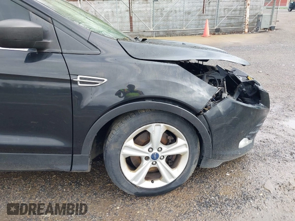 2013 Ford Escape SE with VIN 1FMCU9GX9DUD34661, listed as a IAAI auction lot 41945565 with 239,752 mi miles and . Bid and sale history available at DreamBid. Image 20.