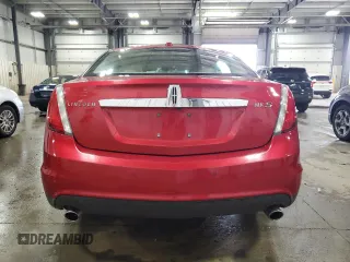 2010 Lincoln MKS z VIN 1LNHL9DR6AG614417, wystawiony jako Copart lot #54328705 z przebiegiem 124 443 mil mil oraz Szkoda całkowita • Salvage title. Historia ofert i sprzedaży dostępna na DreamBid. Obrazek 6.