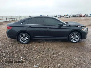 2023 Volkswagen Jetta SE with VIN 3VW7M7BU9PM013345, listed as a IAAI auction lot 42203990 with 15,859 mi miles and . Bid and sale history available at DreamBid. Image 14.