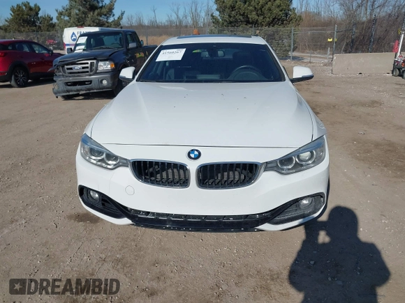 2016 BMW 4 Series 428i xDrive with VIN WBA4C9C59GG138090, listed as a IAAI auction lot 41560267 with 94,010 mi miles and . Bid and sale history available at carsss.com. Image 12.
