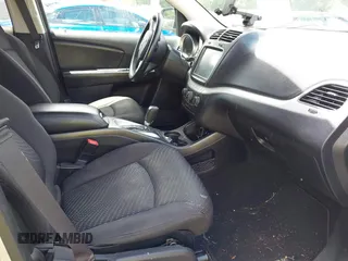 2014 Dodge Journey SXT with VIN 3C4PDCBB0ET281861, listed as a IAAI auction lot 42187485 with 124,191 mi miles and . Bid and sale history available at DreamBid. Image 5.