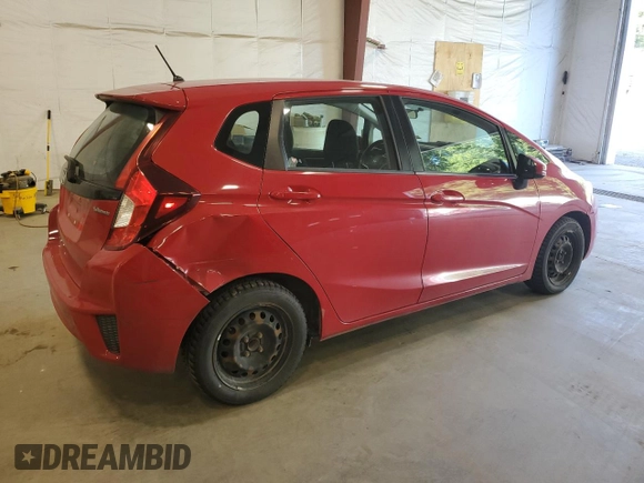 2015 Honda Fit LX with VIN 3HGGK5G55FM780043, listed as a Copart auction lot 69003154 with 141,424 mi miles and Salvage Title. Bid and sale history available at carsss.com. Image 3.