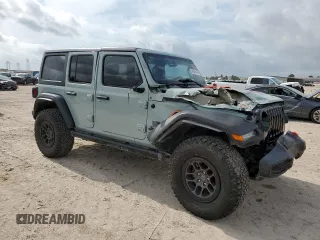 2023 Jeep Wrangler Willys with VIN 1C4HJXDN6PW664826, listed as a Copart auction lot 54842415 with 20,004 mi miles and Salvage Title. Bid and sale history available at DreamBid. Image 4.