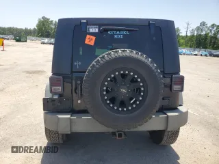 2008 Jeep Wrangler Unlimited X z VIN 1J4GA391X8L532319, wystawiony jako Copart lot #57292495 z przebiegiem Nie podano mil oraz Szkoda całkowita • Salvage title. Historia ofert i sprzedaży dostępna na DreamBid. Obrazek 6.