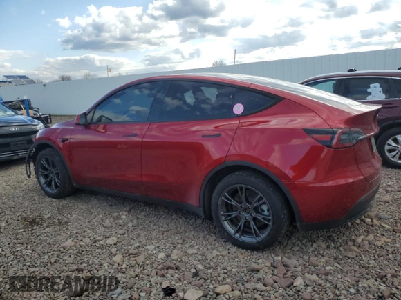 2024 Tesla Model Y Long Range z VIN 7SAYGDEE8RA302077, wystawiony jako Copart lot #52622465 z przebiegiem 11 830 mil mil oraz Szkoda całkowita • Salvage title. Historia ofert i sprzedaży dostępna na DreamBid. Obrazek 2.