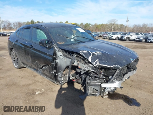 2022 BMW X4 M40i with VIN 5UX43DT0XN9L33898, listed as a IAAI auction lot 41642374 with 8 mi miles and . Bid and sale history available at DreamBid. Image 6.