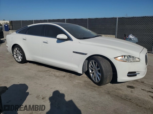 2013 Jaguar XJ with VIN SAJWJ1CD7D8V49845, listed as a Copart auction lot 44541595 with 115,931 mi miles and Clean title. Bid and sale history available at DreamBid. Image 4.