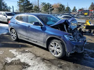 2018 BMW X2 xDrive28i with VIN WBXYJ5C37JEF69697, listed as a Copart auction lot 88116785 with 48,721 mi miles and Salvage Title. Bid and sale history available at carsss.com. Image 4.