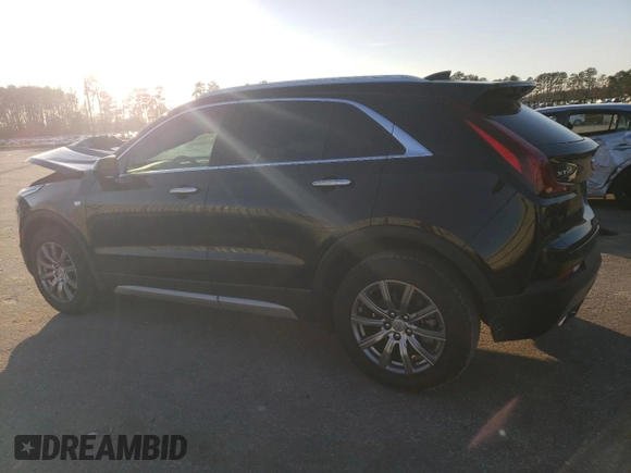 2020 Cadillac XT4 FWD Premium Luxury z VIN 1GYFZCR44LF056476, wystawiony jako Copart lot #43559495 z przebiegiem 51 076 mil mil oraz Szkody całkowita. Historia ofert i sprzedaży dostępna na DreamBid. Obrazek 2.
