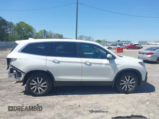2019 Honda Pilot EX-L with VIN 5FNYF5H57KB038019, listed as a IAAI auction lot 41994410 with 126,738 mi miles and . Bid and sale history available at carsss.com. Image 14.