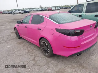 2014 Kia Optima LX z VIN KNAGM4A77E5453187, wystawiony jako IAAI lot #42357588 z przebiegiem 162 501 mil mil oraz . Historia ofert i sprzedaży dostępna na DreamBid. Obrazek 3.
