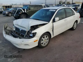 2002 Mitsubishi Lancer LS with VIN JA3AJ36E02U064779, listed as a Copart auction lot 86749184 with 127,343 mi miles and Salvage Title. Bid and sale history available at carsss.com. Image 1.
