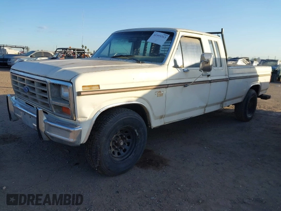 1985 Ford F-250 with VIN 1FTHX2516FKA70773, listed as a IAAI auction lot 41953313 with 986,298 mi miles. Bid and sale history available at carsss.com. Image 2.