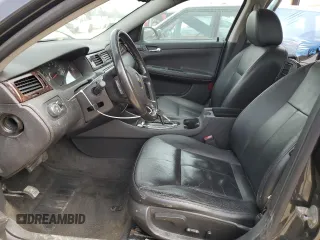 2012 Chevrolet Impala LTZ with VIN 2G1WC5E35C1315525, listed as a Copart auction lot 47987615 with 130,099 mi miles and Salvage Title. Bid and sale history available at DreamBid. Image 7.