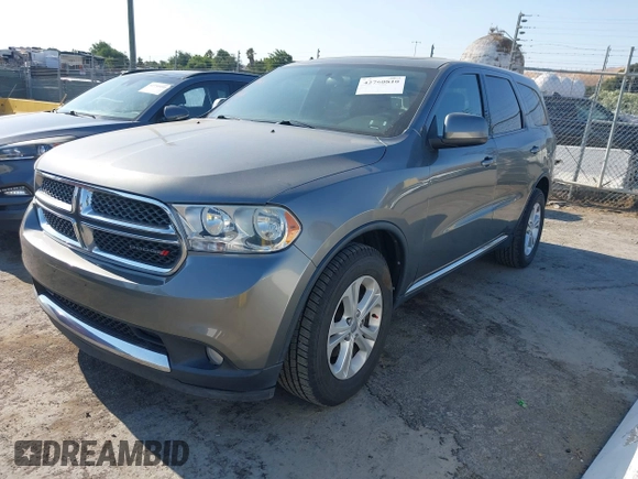 2012 Dodge Durango SXT with VIN 1C4RDJAG2CC271772, listed as a IAAI auction lot 42760810 with 151,215 mi miles and . Bid and sale history available at DreamBid. Image 17.