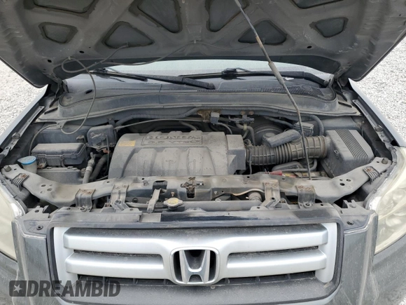 2007 Honda Pilot LX z VIN 2HKYF18197H540268, wystawiony jako Copart lot #59810015 z przebiegiem 201 916 mil mil oraz Szkoda całkowita • Salvage title. Historia ofert i sprzedaży dostępna na DreamBid. Obrazek 12.