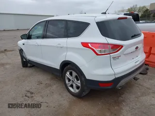 2016 Ford Escape SE with VIN 1FMCU0GX4GUB14442, listed as a IAAI auction lot 41826908 with Not Provided miles and . Bid and sale history available at carsss.com. Image 3.