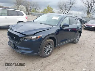 2017 Mazda CX-5 Touring with VIN JM3KFBCL7H0120552, listed as a IAAI auction lot 41953685 with 88,416 mi miles. Bid and sale history available at carsss.com. Image 18.