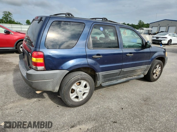 2003 Ford Escape XLT Popular with VIN 1FMCU03123KA03878, listed as a Copart auction lot 60133485 with 298,100 mi miles and Salvage title. Bid and sale history available at DreamBid. Image 3.