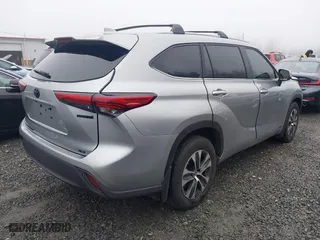 2023 Toyota Highlander Hybrid XLE with VIN 5TDKBRCH3PS118916, listed as a IAAI auction lot 41300848 with 23,981 mi miles. Bid and sale history available at carsss.com. Image 4.