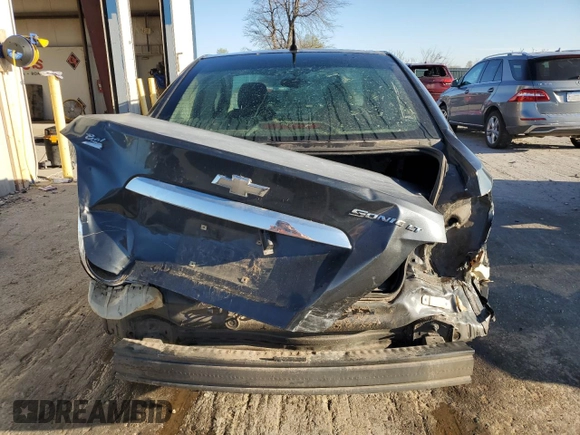 2014 Chevrolet Sonic LT with VIN 1G1JC5SH7E4220059, listed as a Copart auction lot 49877765 with 136,896 mi miles and Salvage Title. Bid and sale history available at DreamBid. Image 6.