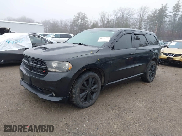 2013 Dodge Durango R/T with VIN 1C4SDJCT8DC520864, listed as a IAAI auction lot 41897974 with 170,580 mi miles and . Bid and sale history available at DreamBid. Image 2.