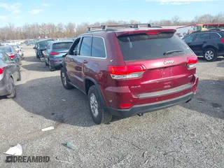 2018 Jeep Grand Cherokee Laredo E with VIN 1C4RJFAG6JC478829, listed as a IAAI auction lot 40899717 with 55,479 mi miles. Bid and sale history available at carsss.com. Image 3.