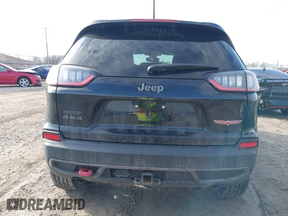 2020 Jeep Cherokee Trailhawk z VIN 1C4PJMBX5LD532516, wystawiony jako IAAI lot #41730502 z przebiegiem 85 543 mil mil oraz . Historia ofert i sprzedaży dostępna na DreamBid. Obrazek 16.