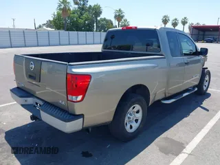 2006 Nissan Titan SE with VIN 1N6AA06A16N519035, listed as a IAAI auction lot 42654720 with 143,497 mi miles and . Bid and sale history available at DreamBid. Image 4.
