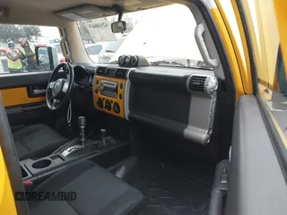2007 Toyota FJ Cruiser with VIN JTEBU11FX70037231, listed as a IAAI auction lot 42018669 with 129,670 mi miles. Bid and sale history available at carsss.com. Image 5.