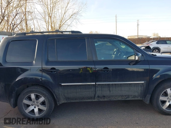 2012 Honda Pilot Touring with VIN 5FNYF4H93CB077057, listed as a IAAI auction lot 41156160 with 139,834 mi miles and . Bid and sale history available at DreamBid. Image 13.