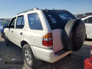 1999 Isuzu Rodeo S z VIN 4S2CM58W0X4306727, wystawiony jako Copart lot #74758994 z przebiegiem 193 850 mil mil oraz Tytuł czysty. Historia ofert i sprzedaży dostępna na DreamBid. Obrazek 2.