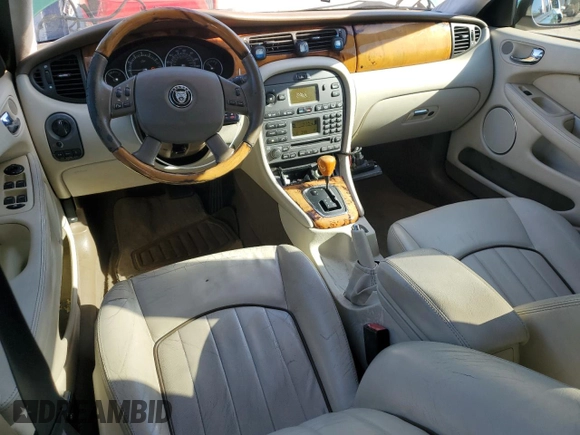 2007 Jaguar X-Type z VIN SAJWA51A87WJ07995, wystawiony jako Copart lot #42737205 z przebiegiem 82 863 mil mil oraz Tytuł czysty. Historia ofert i sprzedaży dostępna na DreamBid. Obrazek 8.